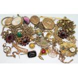 A mixed lot of yellow metal jewellery, various items including pendants, earrings, chains, cameo,