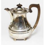 A George V silver coffee pot, S Blanckensee & Son Ltd, Chester 1933, height 21cm, wt. 22oz.