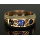 An 18ct gold diamond, sapphire and blue garnet topped doublet ring, sponsor's mark 'JG', Chester