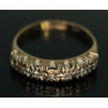 A hallmarked 9ct gold diamond ring, gross wt. 2.31g, size P.