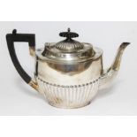 A George V silver teapot, Walker & Hall, Sheffield 1916, length 26cm, wt. 18oz.