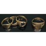 A group of four hallmarked 9ct gold signet rings, gross wt. 11.01g, three as found.