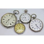 Four antique silver open face pocket watches comprising a mid sized pocket watch with unsigned dial,