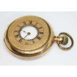An early 20th century English made gold plated half hunter pocket watch having unsigned white enamel