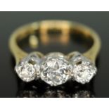 A three stone diamond ring, the Old European cut diamonds weighing approx. 0.30, 0.72 & 0.33 carats,