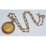 A Victoria 1872 sovereign, yellow metal mount and 46cm chain.