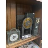 A box of 20th century Lake District and Welsh stone clocks
