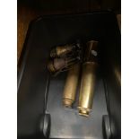 Two brass telescopes and binoculars.