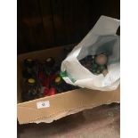 2 pairs of rollerskates and bag of good collection of marbles.