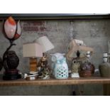 A collection of assorted owl lamps.