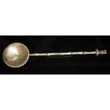 A Scottish hallmarked silver spoon, round bowl, bamboo style stem with owl finial, length 18.5cm,