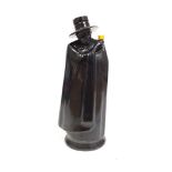 A Royal Doulton Sandman Port black glazed bottle.