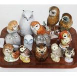 Fourteen assorted owl ornaments comprising Royal Copenhagen, Beswick, Royal Worcester, Goebel, Royal