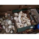 Three boxes of assorted owl ornaments to include soapstone, resin and marble etc.