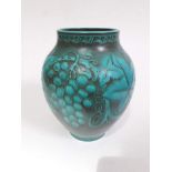 A Pilkington Royal Lancastrian blue green vase by W.S. Mycock, decorated with grapes and vine leaves