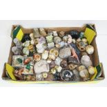 A box of carved stone owls including alabaster, marble etc.