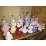 A collection of 23 Coalport figurines, Ladies of Fashion etc, various sizes.