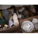 Three boxes of assorted owl garden ornaments.