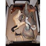 A box containing 8 animal figure ornaments including Beswick, USSR etc