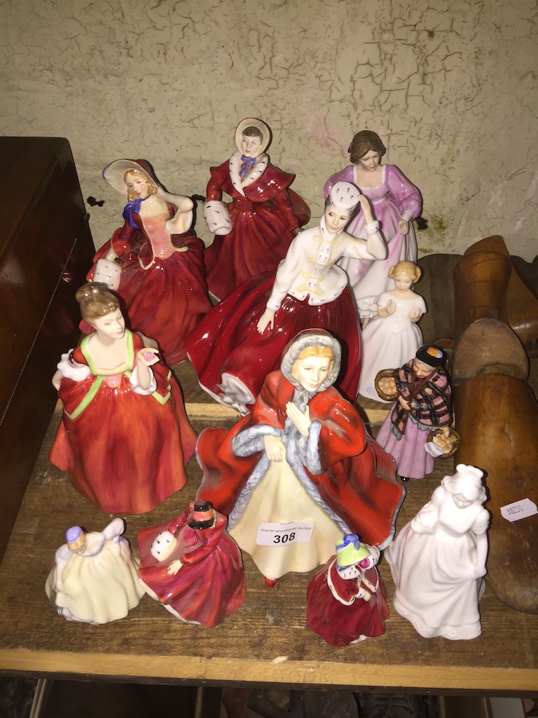 A collection of 12 Royal Doulton lady figurines, various sizes.