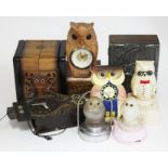 A quantity of vintage owl ornaments comprising a cigarette box, two wooden clocks, a plastic