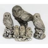 A group of four Country Artist's hallmarked silver owl ornaments, one boxed, heights 45mm to 95mm,