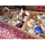Four boxes of assorted owl ornaments