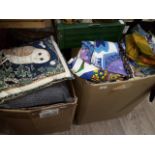 Two boxes of assorted owl textiles to include cushions, clothing and material etc.