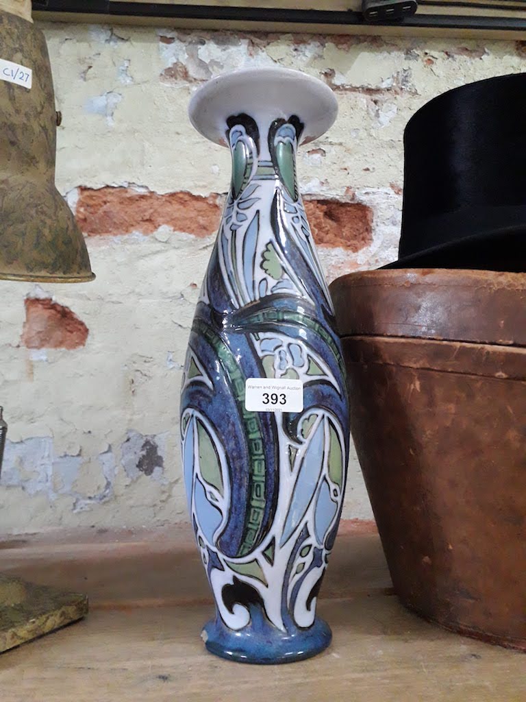 A large Doulton Lambeth Art vase, chip to base, height 39.5cm.