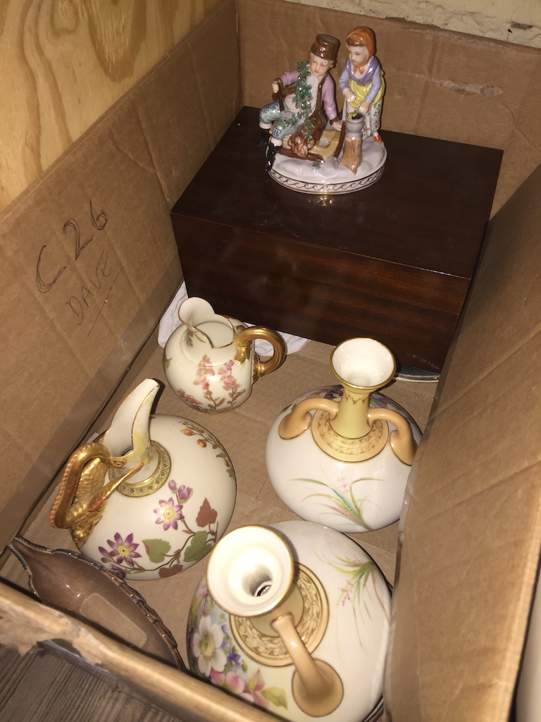 A box containing various items of Royal Worcester icluding a pair of blush ivory vases and two jugs,
