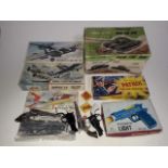 Assorted toys comprising a Tomyline No. 64 Rapid fire Tank, two Airfix models, The Outlaw Patrol 100