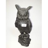 A bronzed owl statue, 37cm high.