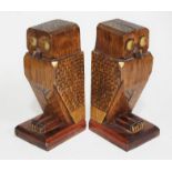 A pair of Art Deco style carved wooden bookends modelled as owls, height 20cm.
