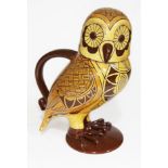 A Phil Arthur Pottery terracotta slip ware jug modelled as an owl, height 26cm. Condition - good,