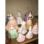 A collection of 9 Coalport lady figurines, mostly Ladies of Fashion, various sizes and one Royal