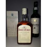 Two bottles of scotch whisky; House of Lords De Luxe Blended 70cl 40% (level- high shoulder)and