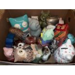 A box of assorted owl money boxes.