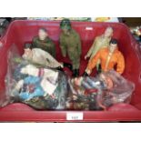 Box containing 5 action man figures, clothes and accessories.