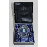 A Wedgwood glass Royal Silver Jubilee paperweight with hallmarked silver mount, boxed.