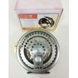 A Total Fishing Gear 4 1/2" classic centre pin reel, loaded with line, in original box. Good