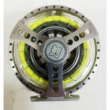 A Hardy Demon 7000 fly fishing reel, loaded with fly line. Good condition, some signs of use/