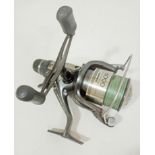 A Shimano 6000 XTEA Super Baitrunner course/ carp fishing reel, loaded with braided mainline with