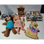 A box of vintage toys to include Lego, Fisher Price clock and 2 dolls etc.