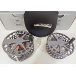 A Waterworks Lamson V-Series V10 4 1/2" fly fishing reel with case, original box and a boxed V-