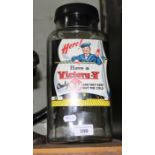 An original glass sweet jar for victory with sailor on label.