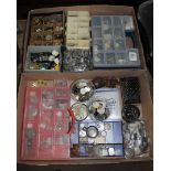 Two trays of vintage watch parts, dials, glasses & staking tools sets.