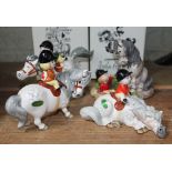 A group of four Beswick Thelwell figures with boxes. Condition - three pottery, one other, good