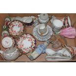 A quantity of porcelain comprising an Art Deco Wedgwood part tea service, Royal Crown Derby part tea