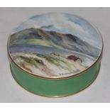 A Royal Crown Derby porcelain casket of cylindrical form and hand painted with a mountain scene,