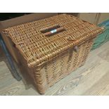 A vintage wicker fishing basket.